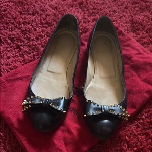 Christian Louboutin Black Flats with Glossy Finish